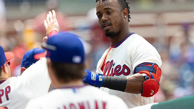 Jul 25, 2021; Philadelphia, Pennsylvania, USA; Philadelphia Phillies shortstop Jean Segura (2) is congratulated after hitting a home run during the fourth inning against the Atlanta Braves at Citizens Bank Park. Mandatory Credit: Bill Streicher-USA TODAY Sports