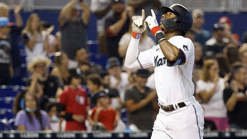 Jul 25, 2021; Miami, Florida, USA; Miami Marlins batter Lewis Brinson (25) reacts after hitting a three-run home run during the sixth inning against the San Diego Padres at loanDepot Park. Mandatory Credit: Rhona Wise-USA TODAY Sports