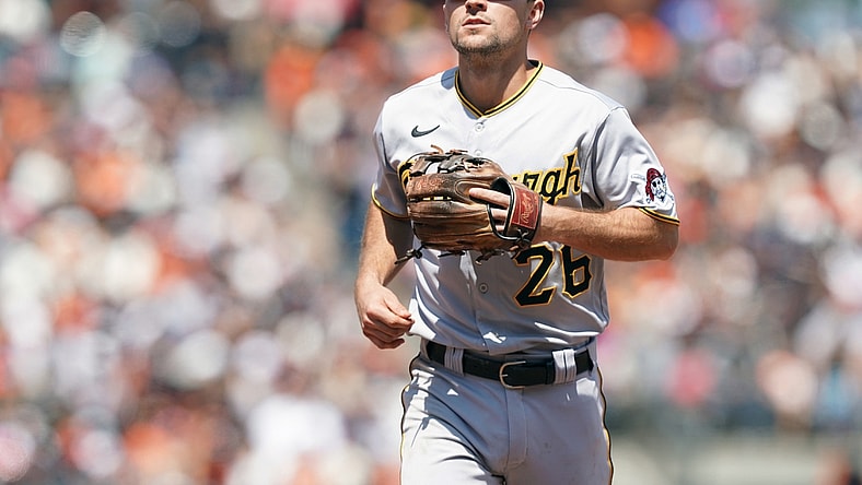 Jul 25, 2021; San Francisco, California, USA; Pittsburgh Pirates second baseman Adam Frazier (26) jogs off the field at the end of the sixth inning against the San Francisco Giants at Oracle Park. Mandatory Credit: Darren Yamashita-USA TODAY Sports