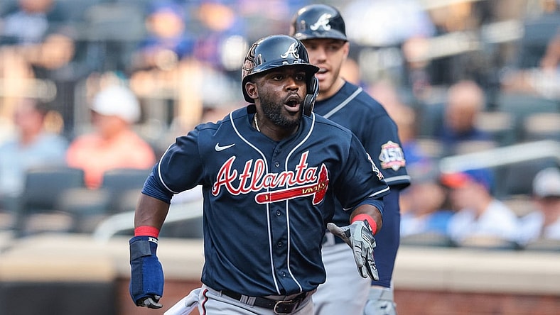 Jul 26, 2021; New York City, New York, USA; Atlanta Braves center fielder Guillermo Heredia (38) reacts after scoring a run against the New York Mets during the third inning at Citi Field. Mandatory Credit: Vincent Carchietta-USA TODAY Sports