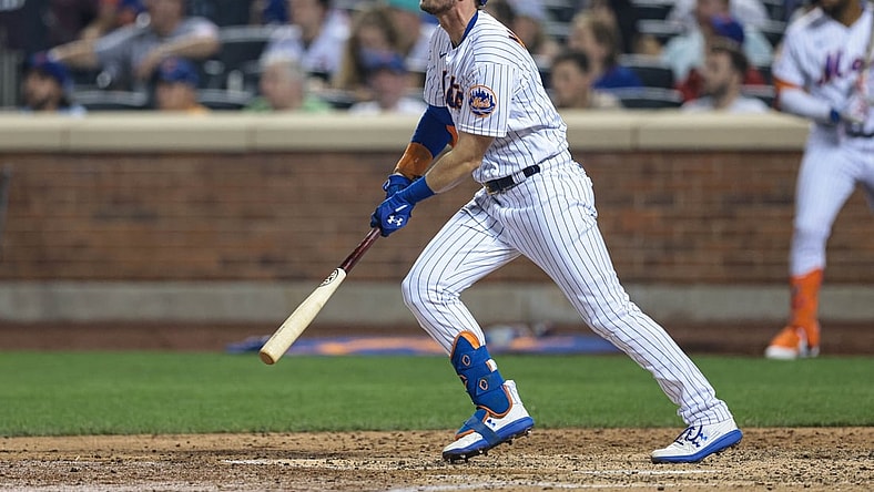 Jul 26, 2021; New York City, New York, USA;  New York Mets third baseman Jeff McNeil (6) hits an RBI double during the fifth inning against the Atlanta Braves  at Citi Field. Mandatory Credit: Vincent Carchietta-USA TODAY Sports