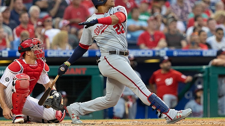 Jul 27, 2021; Philadelphia, Pennsylvania, USA; Washington Nationals left fielder Juan Soto (22) hits a three RBI home run against the Philadelphia Phillies during the second inning at Citizens Bank Park. Mandatory Credit: Bill Streicher-USA TODAY Sports