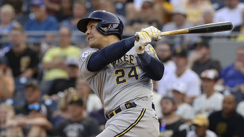 Jul 27, 2021; Pittsburgh, Pennsylvania, USA;  Milwaukee Brewers right fielder Avisail Garcia (24) hits an RBI double against the Pittsburgh Pirates during the second inning at PNC Park. Mandatory Credit: Charles LeClaire-USA TODAY Sports
