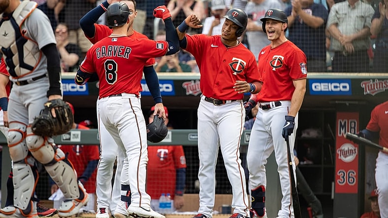 Jul 27, 2021; Minneapolis, Minnesota, USA; Minnesota Twins catcher Mitch Garver (8) celebrates with second baseman Jorge Polanco (11) after hitting a grand slam against the Detroit Tigers during the first inning at Target Field. Mandatory Credit: Jordan Johnson-USA TODAY Sports