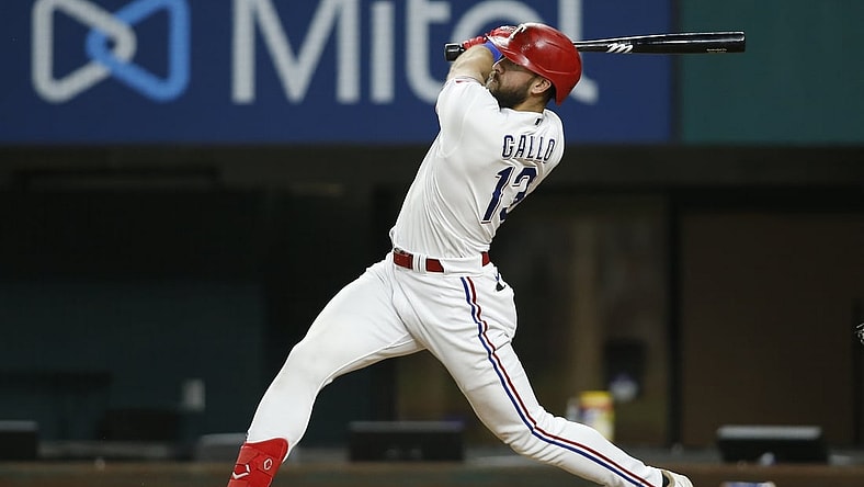 Jul 27, 2021; Arlington, Texas, USA; Texas Rangers right fielder Joey Gallo (13) hits a three run home run in the fourth inning against the Arizona Diamondbacks at Globe Life Field. Mandatory Credit: Tim Heitman-USA TODAY Sports