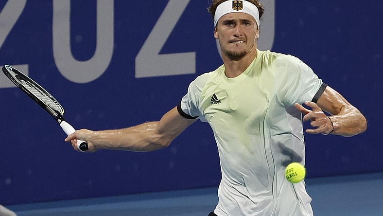Jul 29, 2021; Tokyo, Japan; Alexander Zverev of Germany hits a forehand against Jeremy Chardy of France (not pictured) in a men's singles quarterfinal during the Tokyo 2020 Olympic Summer Games at Ariake Tennis Park. Mandatory Credit: Geoff Burke-USA TODAY Sports