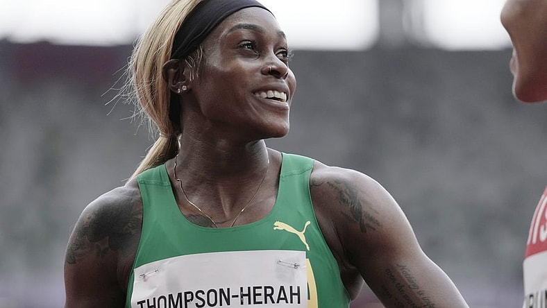 Jul 30, 2021; Tokyo, Japan; Elaine Thompson-Herah (JAM) after competing in the women's 100m preliminary round 1, heat 2during the Tokyo 2020 Olympic Summer Games at Olympic Stadium. Mandatory Credit: James Lang-USA TODAY Sports