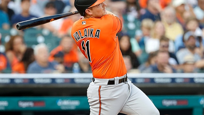 Jul 31, 2021; Detroit, Michigan, USA;  Baltimore Orioles second baseman Pat Valaika (11) hits a two RBI single against the Detroit Tigers in the fifth inning at Comerica Park. Mandatory Credit: Rick Osentoski-USA TODAY Sports