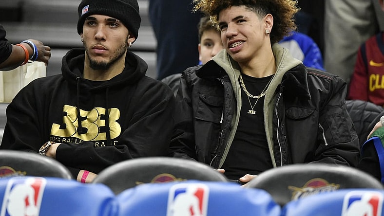 Dec 14, 2017; Cleveland, OH, USA; LiAngelo Ball, left, and LaMelo Ball sit behind the Los Angeles Lakers bench before a game between the Cleveland Cavaliers and the Los Angeles Lakers at Quicken Loans Arena. Mandatory Credit: David Richard-USA TODAY Sports