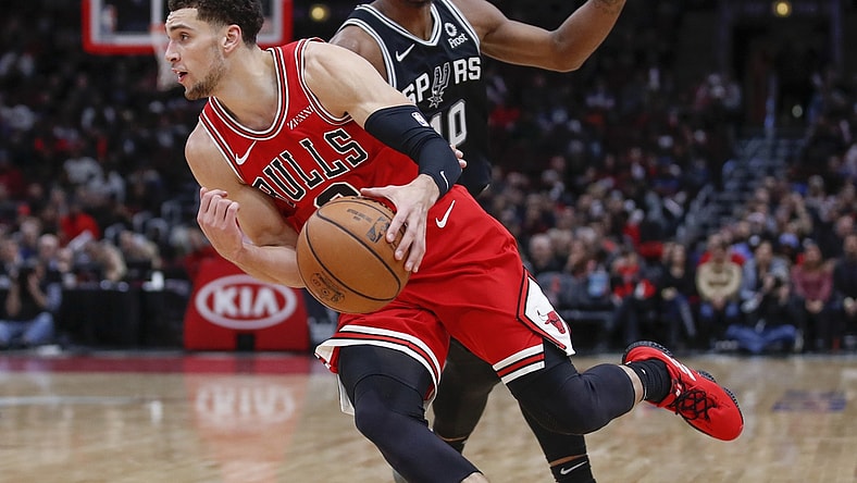 Nov 26, 2018; Chicago, IL, USA; Chicago Bulls guard Zach LaVine (8) drives to the basket past San Antonio Spurs guard DeMar DeRozan (10) during the second half at United Center. Mandatory Credit: Kamil Krzaczynski-USA TODAY Sports