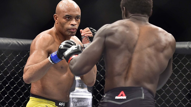 May 11, 2019; Rio de Janeiro, Brazil; Jared Cannonier (red gloves) fights Anderson Silva (blue gloves) during UFC 237 at Jeunesse Arena. Mandatory Credit: Jason Silva-USA TODAY Sports