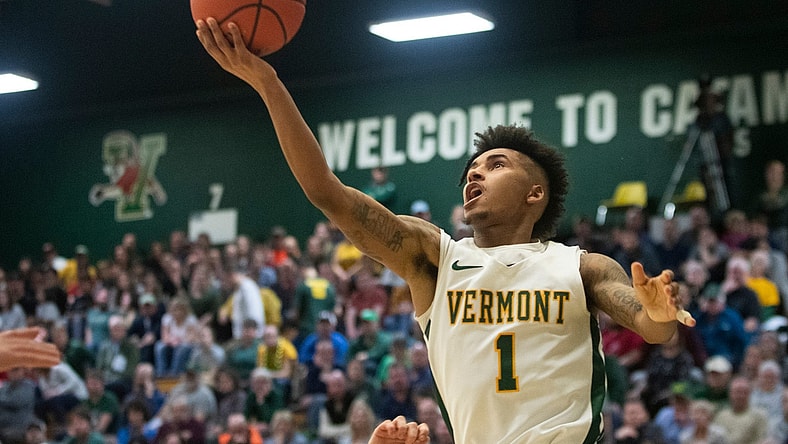 Vermont's Aaron Deloney (1) Leaps for a layup during the men's basketball game between the Albany Great Danes and the Vermont Catamounts at Patrick Gym on Tuesday night March 3, 2020 in Burlington, Vermont.

Albany Vs Vermont Men S Basketball 3 3 20