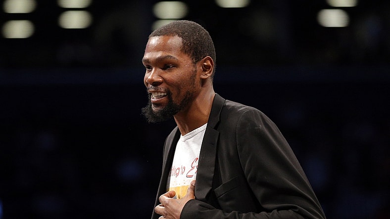 Feb 3, 2020; Brooklyn, New York, USA; Brooklyn Nets small forward Kevin Durant (7) smiles during a time out during the second quarter against the Phoenix Suns at Barclays Center. Mandatory Credit: Brad Penner-USA TODAY Sports