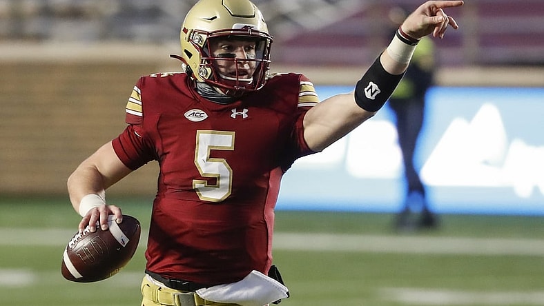 Nov 28, 2020; Chestnut Hill, Massachusetts, USA; Boston College Eagles quarterback Phil Jurkovec (5) directs his receivers during the first half against the Louisville Cardinals at Alumni Stadium. Mandatory Credit: Winslow Townson-USA TODAY Sports