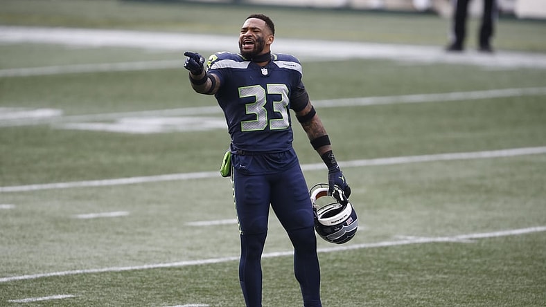 Jan 9, 2021; Seattle, Washington, USA; Seattle Seahawks safety Jamal Adams (33) yells to the sidelines during the first quarter against the Los Angeles Rams at Lumen Field. Mandatory Credit: Joe Nicholson-USA TODAY Sports