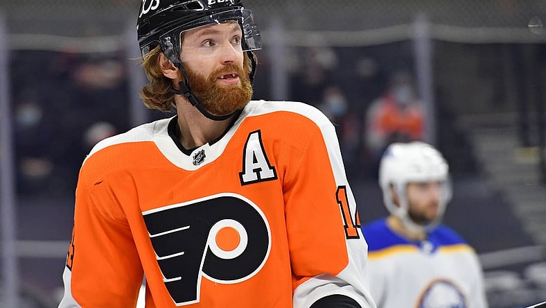 Mar 9, 2021; Philadelphia, Pennsylvania, USA; Philadelphia Flyers center Sean Couturier (14) against the Buffalo Sabres during the third period at Wells Fargo Center. Mandatory Credit: Eric Hartline-USA TODAY Sports