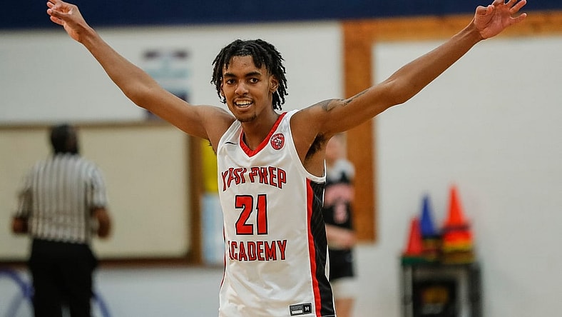 Ypsi Prep forward Emoni Bates (21) celebrates a play against SPIRE Academy during the second half at Central Academy in Ann Arbor, Saturday, March 13, 2021.