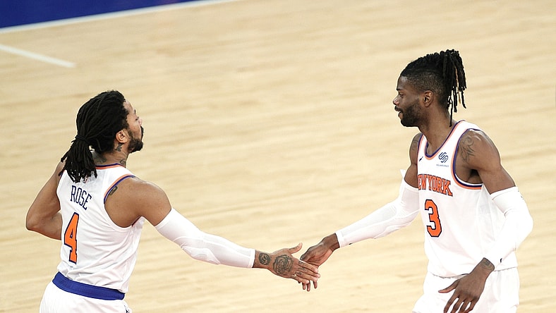 Apr 20, 2021; New York, New York, USA;  Nerlens Noel #3 and Derrick Rose #4 of the New York Knicks high-five during the second half against the Charlotte Hornets at Madison Square Garden. Mandatory Credit:  Sarah Stier/POOL PHOTOS-USA TODAY Sports