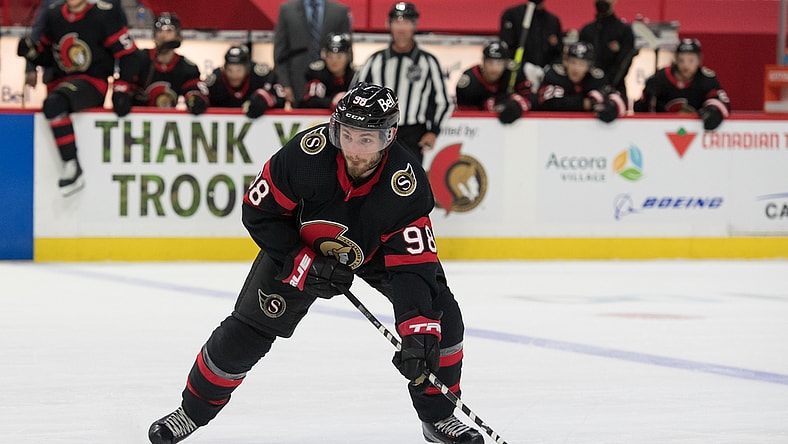 May 3, 2021; Ottawa, Ontario, CAN; Ottawa Senators defenseman Victor Mete (98) controls the puck in the second period against the Winnipeg Jets at the Canadian Tire Centre. Mandatory Credit: Marc DesRosiers-USA TODAY Sports