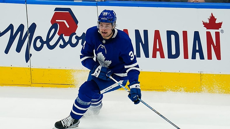 May 20, 2021; Toronto, Ontario, CAN; Toronto Maple Leafs forward Auston Matthews (34) carries the puck against the Montreal Canadiens during the first period of game one of the first round of the 2021 Stanley Cup Playoffs at Scotiabank Arena. Mandatory Credit: John E. Sokolowski-USA TODAY Sports