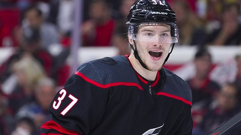Jun 8, 2021; Raleigh, North Carolina, USA; Carolina Hurricanes right wing Andrei Svechnikov (37) reacts against the Tampa Bay Lightning in game five of the second round of the 2021 Stanley Cup Playoffs at PNC Arena. Mandatory Credit: James Guillory-USA TODAY Sports
