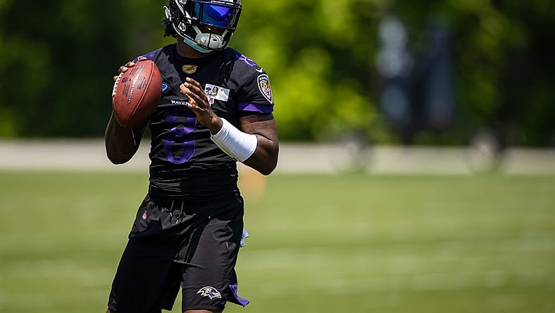 May 26, 2021; Owings Mills, Maryland, USA; Baltimore Ravens quarterback Lamar Jackson (8) in action during an OTA at Under Armour Performance Center. Mandatory Credit: Scott Taetsch-USA TODAY Sports