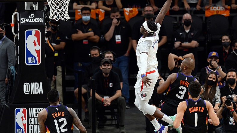 Jun 28, 2021; Phoenix, Arizona, USA; LA Clippers guard Reggie Jackson (1) dunks against the Phoenix Suns during the second half of game five of the Western Conference Finals for the 2021 NBA Playoffs at Phoenix Suns Arena. Mandatory Credit: Joe Camporeale-USA TODAY Sports