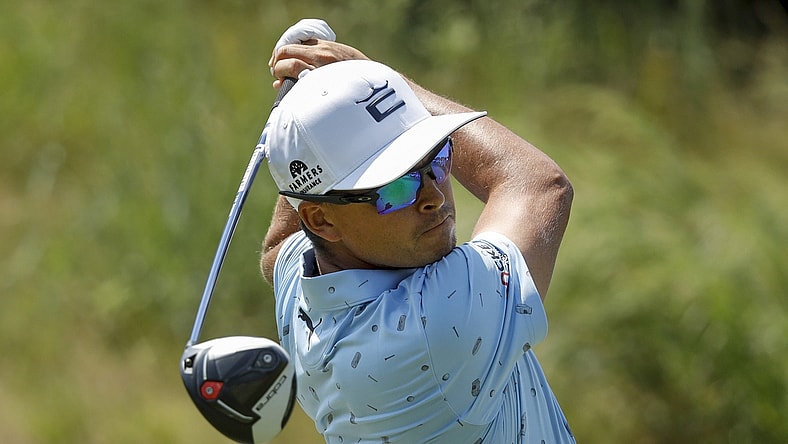 Jul 24, 2021; Blaine, Minnesota, USA; Rickie Fowler drives from the 12th tee during the third round of the 3M Open golf tournament. Mandatory Credit: Bruce Kluckhohn-USA TODAY Sports
