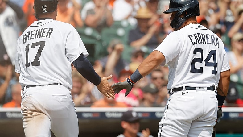 Aug 1, 2021; Detroit, Michigan, USA; Detroit Tigers catcher Grayson Greiner (17) receives congratulations from designated hitter Miguel Cabrera (24) after scoring in the seventh inning against the Baltimore Orioles at Comerica Park. Mandatory Credit: Rick Osentoski-USA TODAY Sports