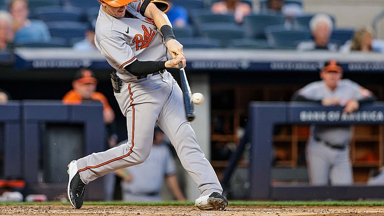 Aug 2, 2021; Bronx, New York, USA; Baltimore Orioles  right fielder Austin Hays (21) hits a home run during the third inning against the New York Yankees at Yankee Stadium. Mandatory Credit: Vincent Carchietta-USA TODAY Sports