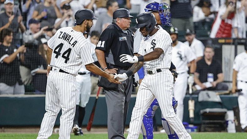Aug 3, 2021; Chicago, Illinois, USA; Chicago White Sox shortstop Tim Anderson (7) celebrates with catcher Seby Zavala (44) after hitting a two-run home run against the Kansas City Royals during the third inning at Guaranteed Rate Field. Mandatory Credit: Kamil Krzaczynski-USA TODAY Sports