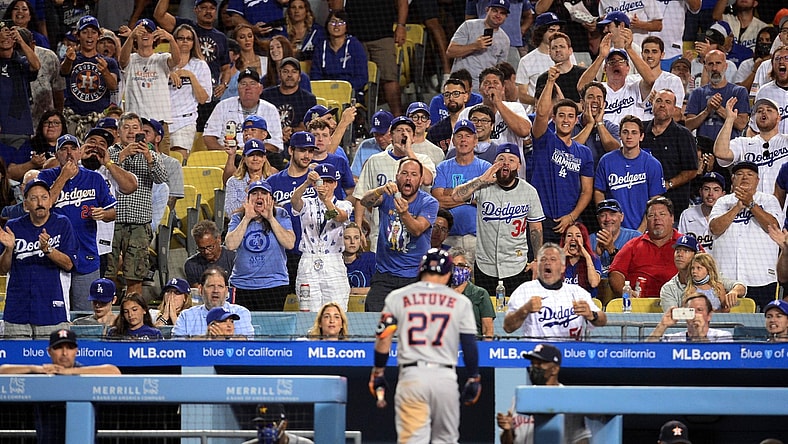 Aug 3, 2021; Los Angeles, California, USA; Spectators react after Houston Astros second baseman Jose Altuve (27) strikes out against the Los Angeles Dodgers during the fifth inning at Dodger Stadium. Mandatory Credit: Gary A. Vasquez-USA TODAY Sports