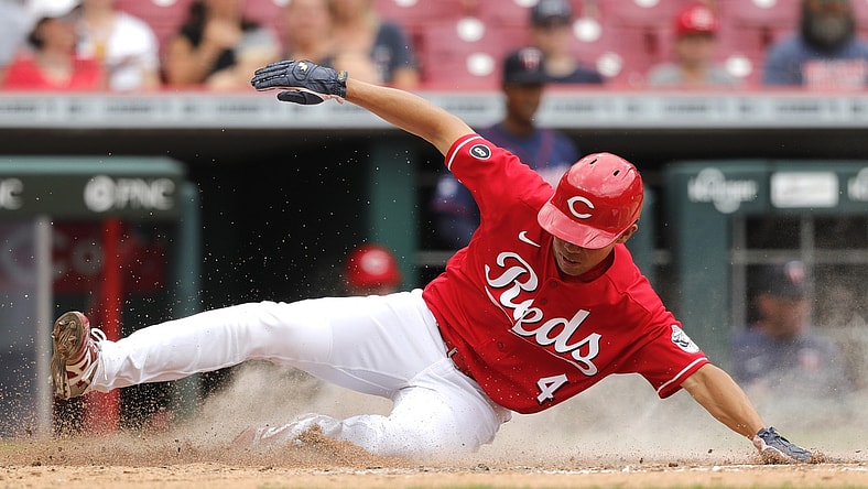 Aug 4, 2021; Cincinnati, Ohio, USA; Cincinnati Reds center fielder Shogo Akiyama (4) scores against the Minnesota Twins during the third inning at Great American Ball Park. Mandatory Credit: David Kohl-USA TODAY Sports
