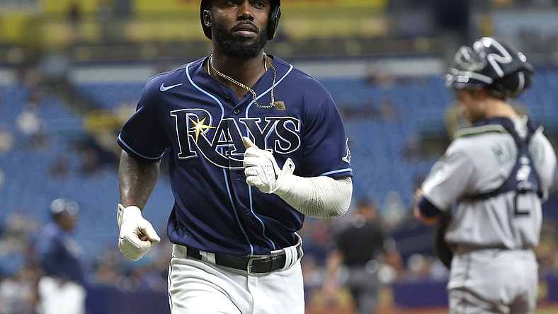 Aug 4, 2021; St. Petersburg, Florida, USA; Tampa Bay Rays left fielder Randy Arozarena (56) scores a run during the third inning against the Seattle Mariners at Tropicana Field. Mandatory Credit: Kim Klement-USA TODAY Sports