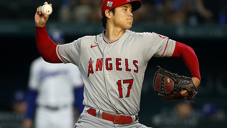 Aug 4, 2021; Arlington, Texas, USA; Los Angeles Angels starting pitcher Shohei Ohtani (17) throws a pitch against the Texas Rangers in the first inning at Globe Life Field. Mandatory Credit: Tim Heitman-USA TODAY Sports