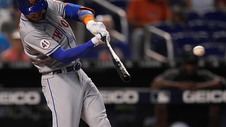 Aug 5, 2021; Miami, Florida, USA; New York Mets center fielder Albert Almora Jr. (4) singles in the 2nd inning against the Miami Marlins at loanDepot park. Mandatory Credit: Jasen Vinlove-USA TODAY Sports