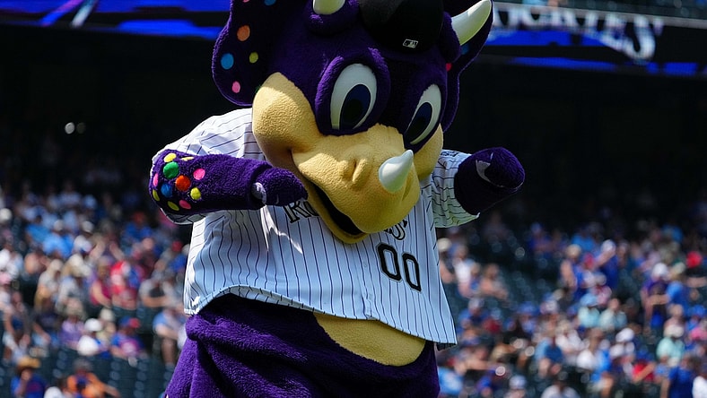 Aug 5, 2021; Denver, Colorado, USA; Colorado Rockies mascot Dinger performs before a game against the Chicago Cubs at Coors Field. Mandatory Credit: Ron Chenoy-USA TODAY Sports