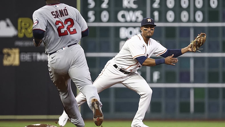 Aug 5, 2021; Houston, Texas, USA; Minnesota Twins first baseman Miguel Sano (22) is forced out as Houston Astros shortstop Robel Garcia (9) steps on second base during the sixth inning at Minute Maid Park. Mandatory Credit: Troy Taormina-USA TODAY Sports