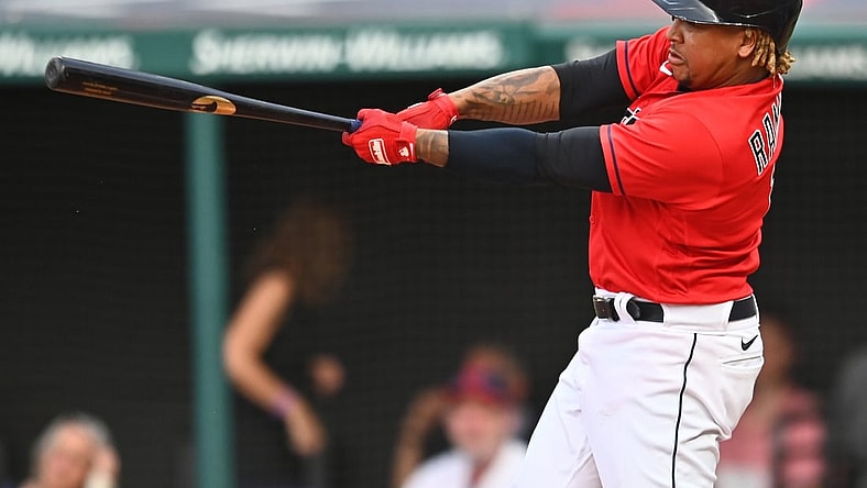 Aug 6, 2021; Cleveland, Ohio, USA; Cleveland Indians designated hitter Jose Ramirez (11) hits a double during the third inning against the Detroit Tigers at Progressive Field. Mandatory Credit: Ken Blaze-USA TODAY Sports