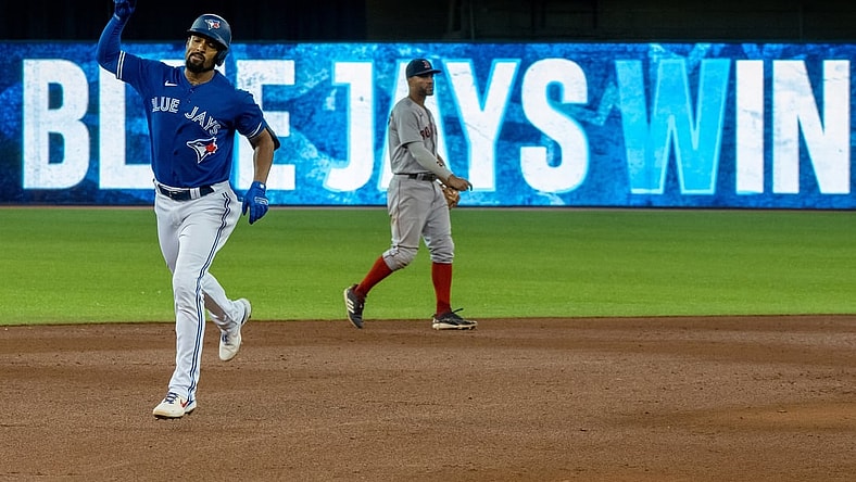 Aug 7, 2021; Toronto, Ontario, CAN; Toronto Blue Jays shortstop Marcus Semien (10) hits a walk off home run against the Boston Red Sox during the seventh inning at Rogers Centre. Mandatory Credit: Kevin Sousa-USA TODAY Sports
