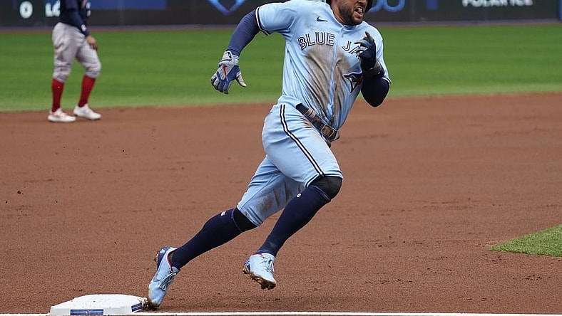 Aug 8, 2021; Toronto, Ontario, CAN; Toronto Blue Jays center fielder George Springer (4) heads for home on a single by designated hitter Corey Dickerson (not pictured) against the Boston Red Sox in the first inning at Rogers Centre. Mandatory Credit: John E. Sokolowski-USA TODAY Sports
