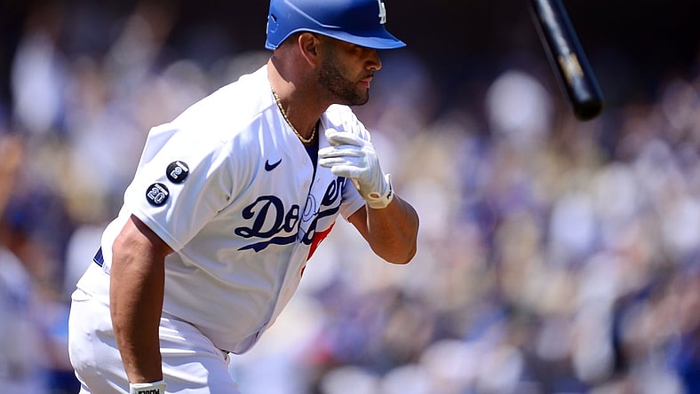 Aug 8, 2021; Los Angeles, California, USA; Los Angeles Dodgers first baseman Albert Pujols (55) hits a two run home run against the Los Angeles Angels during the second inning at Dodger Stadium. Mandatory Credit: Gary A. Vasquez-USA TODAY Sports