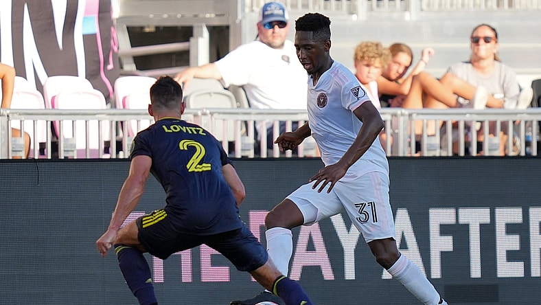 Aug 8, 2021; Fort Lauderdale, FL, USA; Inter Miami CF defender Kelvin Leerdam (31) dribbles the ball around Nashville SC defender Daniel Lovitz (2) during the first half at DRV PNK Stadium. Mandatory Credit: Jasen Vinlove-USA TODAY Sports