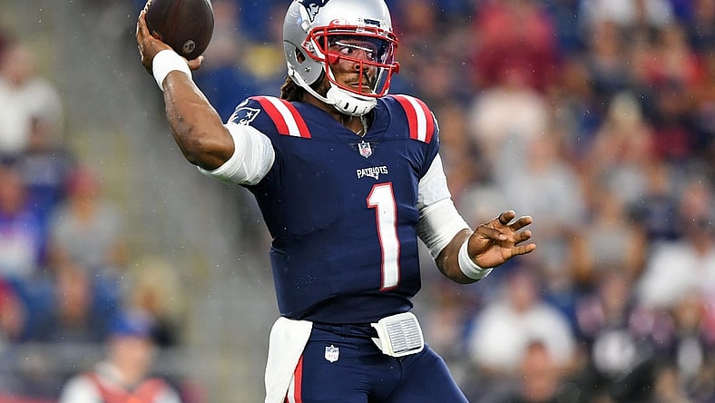Aug 12, 2021; Foxborough, Massachusetts, USA; New England Patriots quarterback Cam Newton (1) throws the ball during the first half of a game against the Washington Football Team at Gillette Stadium. Mandatory Credit: Brian Fluharty-USA TODAY Sports