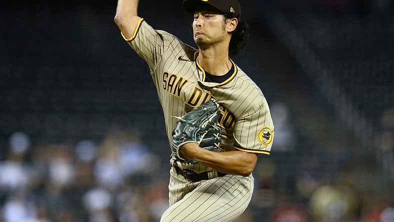 Aug 12, 2021; Phoenix, Arizona, USA; San Diego Padres pitcher Yu Darvish (11) throws against the Arizona Diamondbacks during the first inning at Chase Field. Mandatory Credit: Joe Camporeale-USA TODAY Sports
