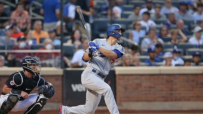 Aug 13, 2021; New York City, NY, USA; Los Angeles Dodgers shortstop Corey Seager (5) follows through on an RBI double against the New York Mets during the first inning at Citi Field. Mandatory Credit: Brad Penner-USA TODAY Sports