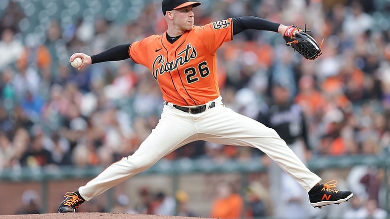 Aug 13, 2021; San Francisco, California, USA; San Francisco Giants starting pitcher Anthony DeSclafani (26) throws a pitch during the first inning against the Colorado Rockies at Oracle Park. Mandatory Credit: Sergio Estrada-USA TODAY Sports