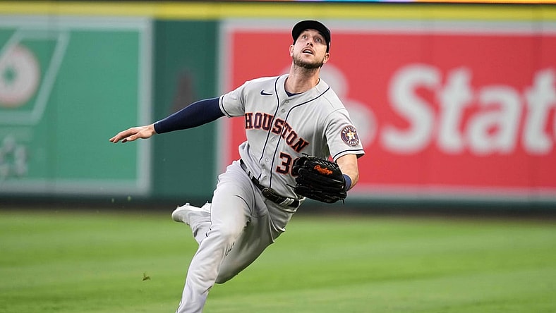 Aug 13, 2021; Anaheim, California, USA; Houston Astros right fielder Kyle Tucker (30) plays for the ball in the third inning against the Los Angeles Angels at Angel Stadium. Mandatory Credit: Kirby Lee-USA TODAY Sports