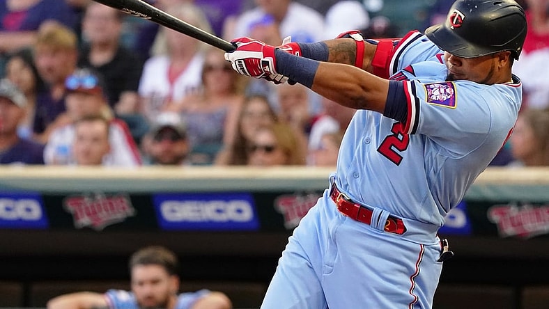 Aug 14, 2021; Minneapolis, Minnesota, USA;  Minnesota Twins infielder Luis Arraez (2) hits an RBI-single off of Tampa Bay Rays starting pitcher Michael Wacha (52) during the first inning at Target Field. Mandatory Credit: Nick Wosika-USA TODAY Sports