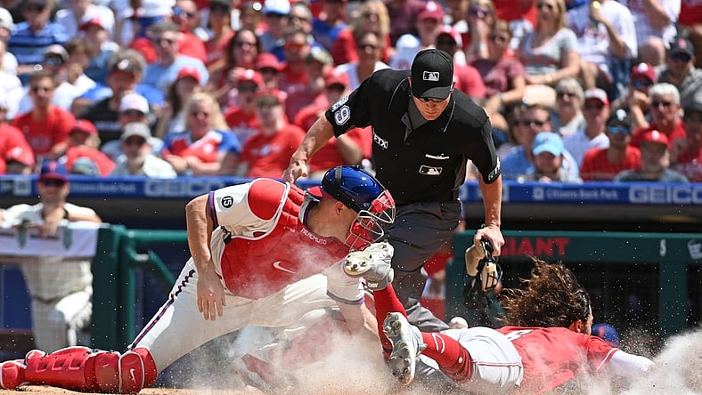 Aug 15, 2021; Philadelphia, Pennsylvania, USA; Cincinnati Reds third baseman Jonathan India (6) slides safely into home ahead of throw to Philadelphia Phillies catcher J.T. Realmuto (left) during the third inning at Citizens Bank Park. Mandatory Credit: Eric Hartline-USA TODAY Sports